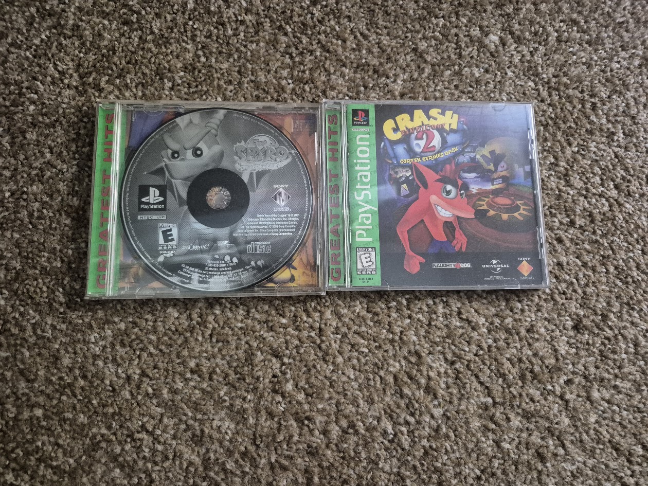 Copies of Spyro: Year of the Dragon and Crash Bandicoot 2: Cortex Strikes Back for the Sony PlayStation