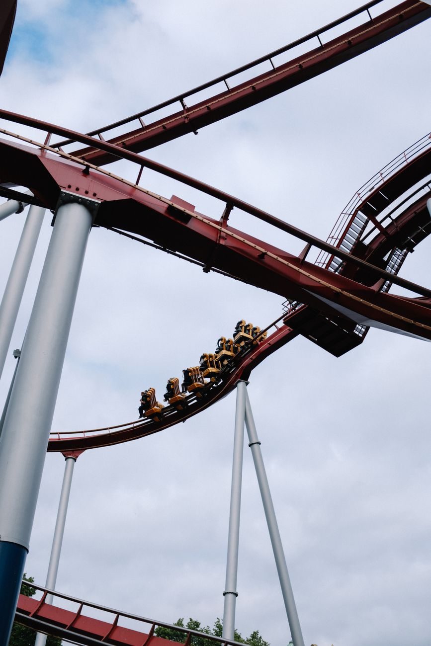 people riding a roller coaster