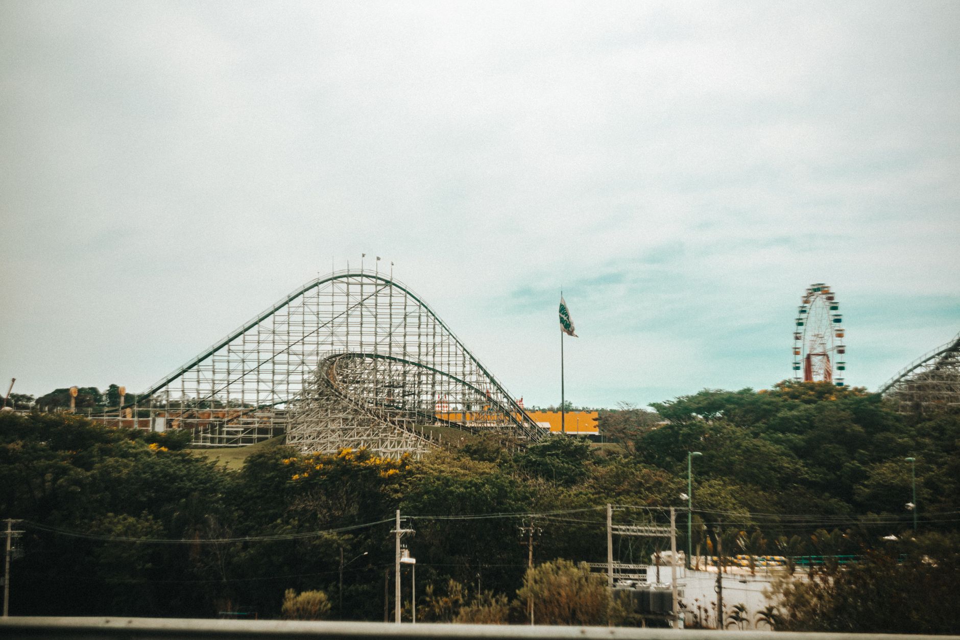 exciting theme park with roller coaster ride